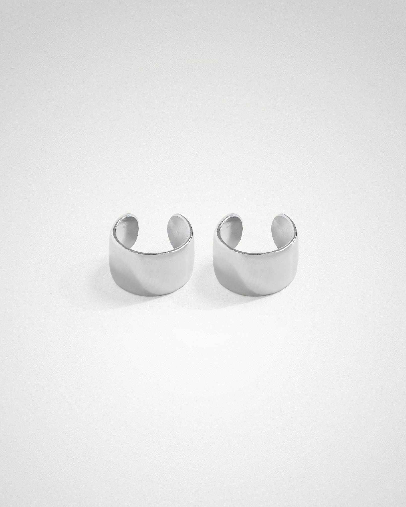 Cleo ear cuff in sterling silver styled as a conch piercing, no piercing needed.