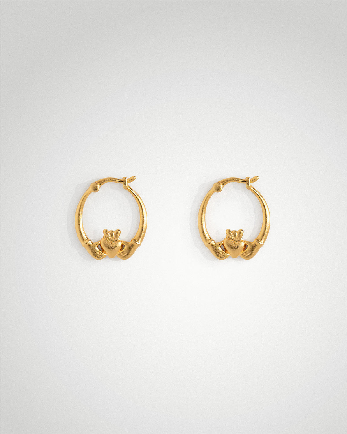 18k gold-plated mid Claddagh hoop earrings by Lines &amp; Current
