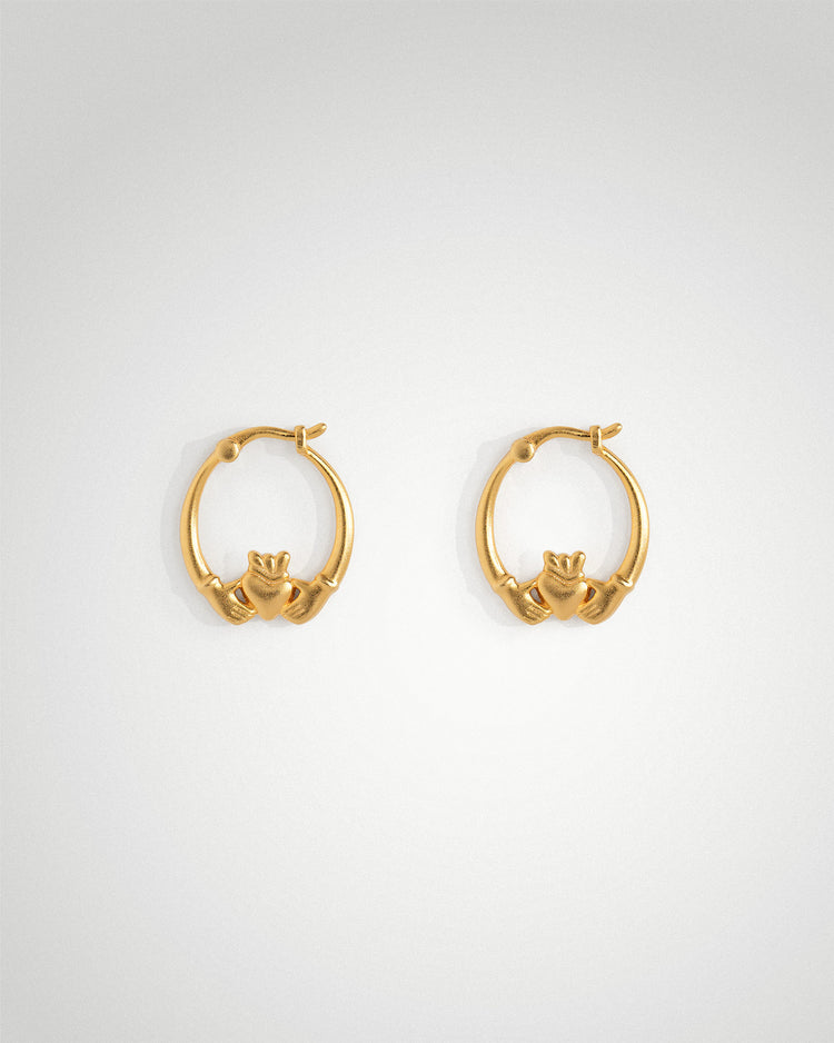 Sterling silver mid Claddagh hoop earrings and Claddagh ring by Lines & Current
