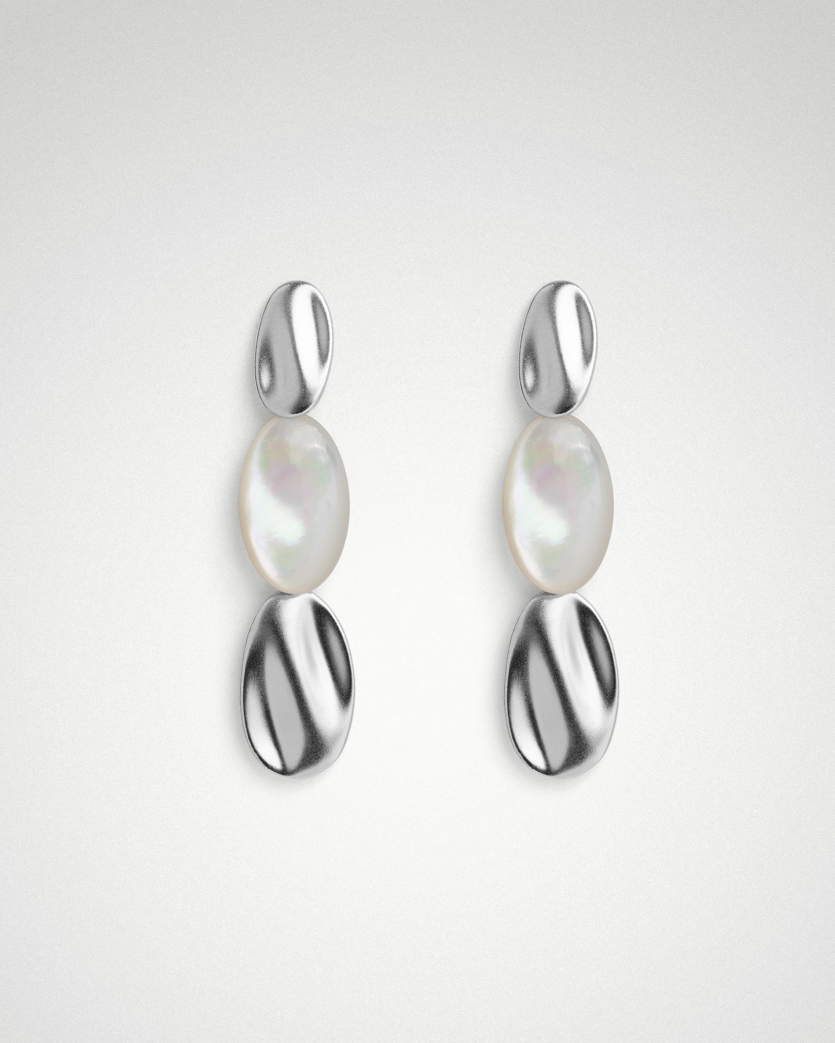 Sigrid Cascade drop earrings, three cascading shell ovals, 41mm drop, rhodium or 18k gold.