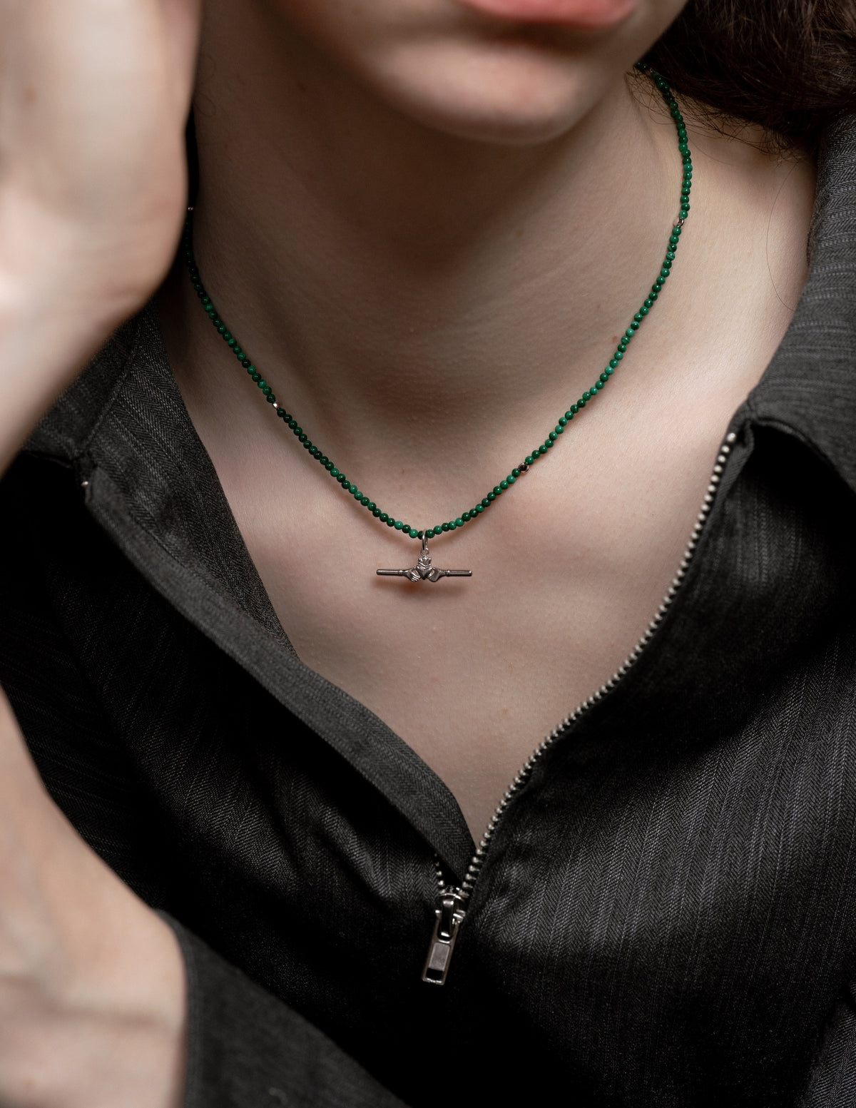 Sterling silver Claddagh bar charm on the Madison malachite beaded necklace by Lines &amp; Current
