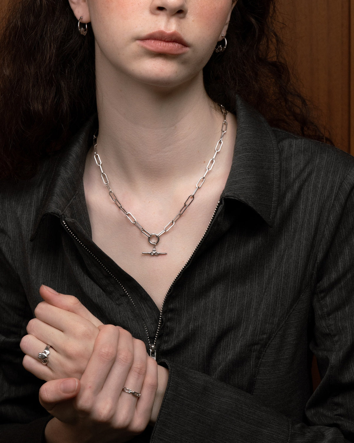 Sterling silver Claddagh bar charm on the Paloma paperclip necklace by Lines &amp; Current