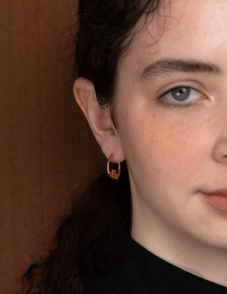 18k gold-plated mid Claddagh hoop earrings and Claddagh ring by Lines & Current