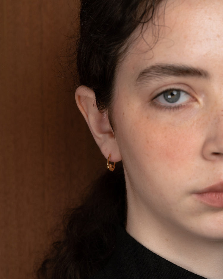 18k gold-plated mini Claddagh hoop earrings by Lines & Current