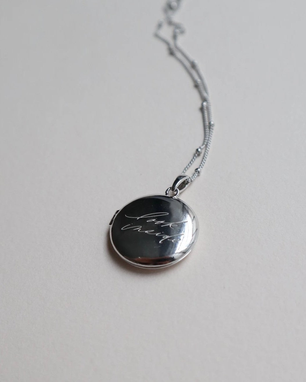 'Look Inside' Circle Locket