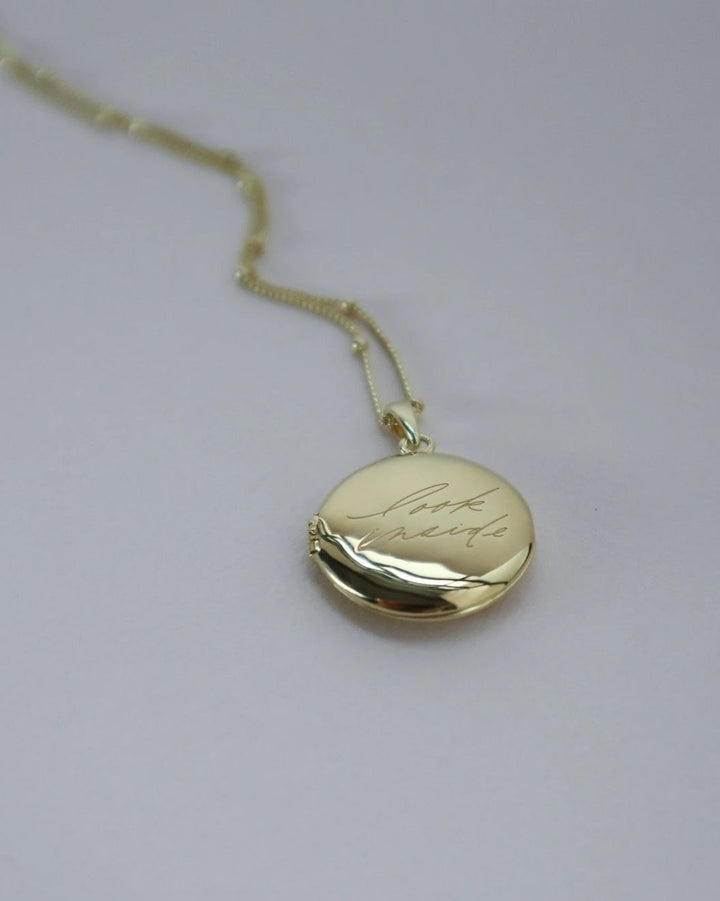 'Look Inside' Circle Locket