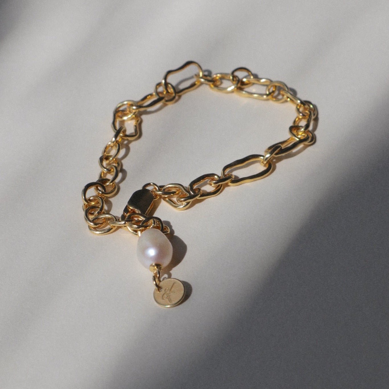 &#39;Frieda&#39; Molten Cable Bracelet with Freshwater Pearl - Lines &amp; Current